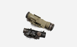 Image of ruggedized optics, showcasing durable scopes and red dot sights designed for harsh environments, providing reliable performance and precision in extreme conditions.