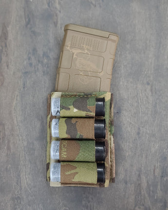  "12 Gauge Single 5.56 Midlength KYWI Pouch - Tactical Gear Accessory for Efficient Ammunition Management and Rapid Deployment in High-Stakes Situations."