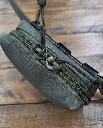 "Mini Belt Mountable GP Pouch - Compact and versatile gear storage designed for easy attachment to belts. Elevate your tactical setup with this pouch, offering organized and efficient storage for small essentials."