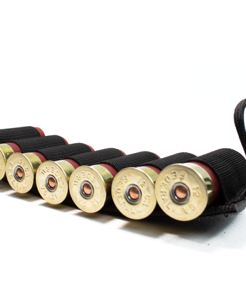 Image of the Esstac 7 Round 12 Gauge Shotgun Card, showcasing a durable, low-profile design with elastic loops for securely holding 7 shotgun shells. Ideal for rapid reloads and easy mounting on tactical gear.