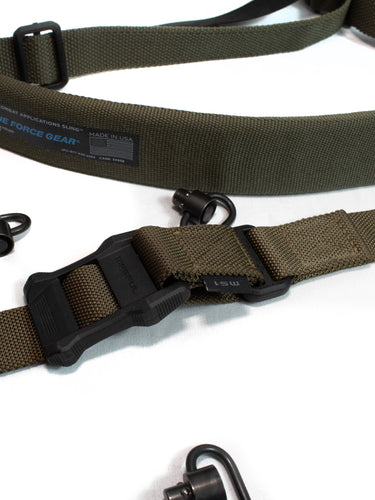 Close-up image of rugged tactical weapon slings, showcasing adjustable straps and heavy-duty materials for reliable firearm retention. Perfect for military, law enforcement, and outdoor enthusiasts seeking comfort and durability.