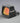"Image of the Holosun 507COMP red dot sight, featuring a rugged aluminum housing, multi-reticle system, and solar panel for extended battery life. The sight is mounted on a pistol slide, showcasing its compact design and easy-to-use controls."